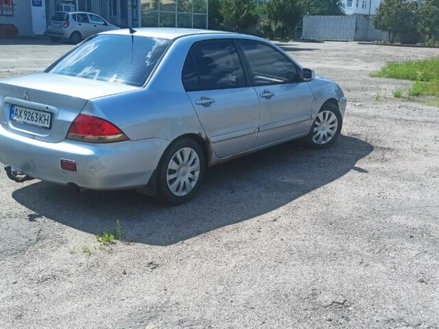 Сірий Міцубісі Lancer, об'ємом двигуна 1.6 л та пробігом 274 тис. км за 3200 $, фото 4 на Automoto.ua