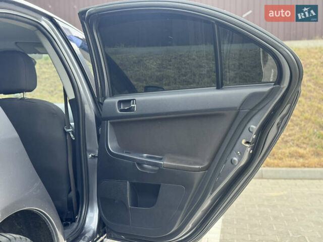 Сірий Міцубісі Lancer, об'ємом двигуна 2 л та пробігом 222 тис. км за 6300 $, фото 15 на Automoto.ua