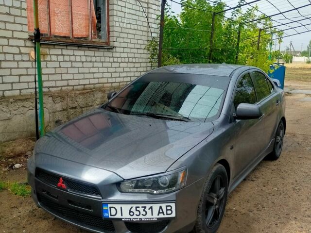 Серый Мицубиси Лансер, объемом двигателя 2 л и пробегом 351 тыс. км за 7000 $, фото 12 на Automoto.ua