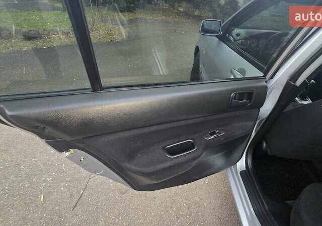 Сірий Міцубісі Lancer, об'ємом двигуна 1.6 л та пробігом 213 тис. км за 3600 $, фото 25 на Automoto.ua