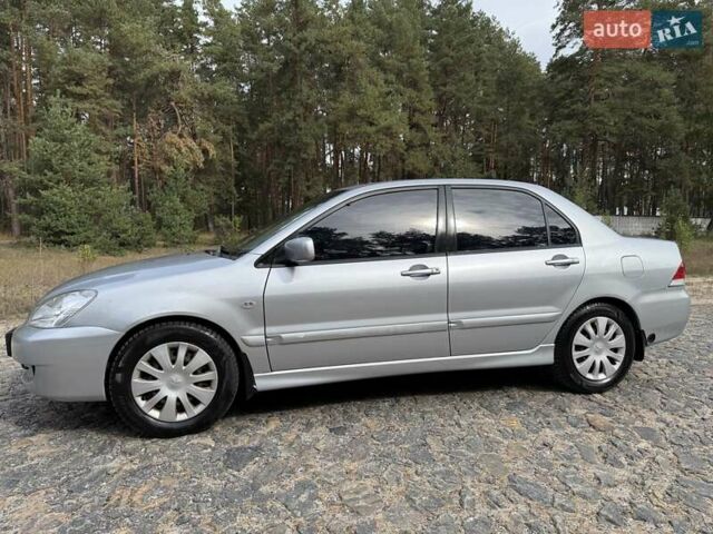 Серый Мицубиси Лансер, объемом двигателя 1.6 л и пробегом 200 тыс. км за 4400 $, фото 14 на Automoto.ua