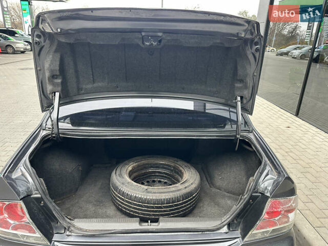 Сірий Міцубісі Lancer, об'ємом двигуна 1.6 л та пробігом 115 тис. км за 2800 $, фото 19 на Automoto.ua