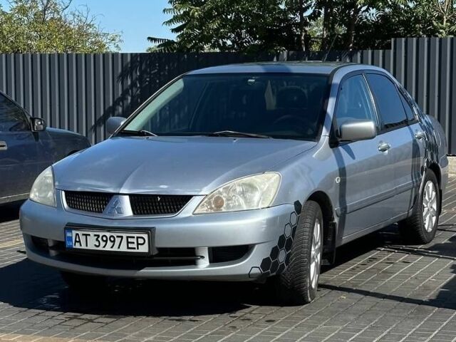 Сірий Міцубісі Lancer, об'ємом двигуна 1.6 л та пробігом 460 тис. км за 3200 $, фото 1 на Automoto.ua