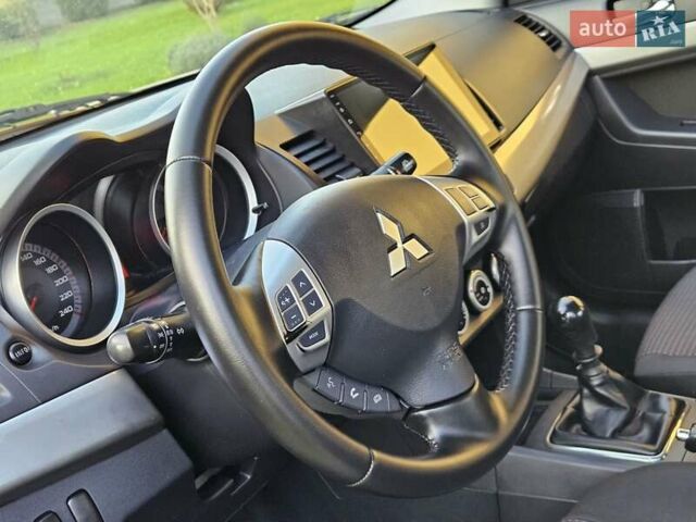 Серый Мицубиси Лансер, объемом двигателя 2 л и пробегом 282 тыс. км за 5450 $, фото 46 на Automoto.ua