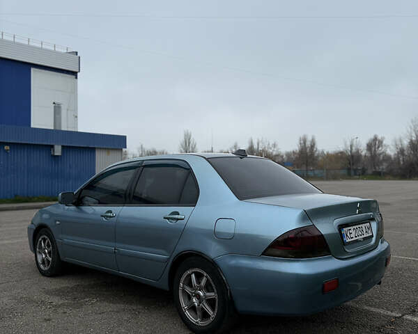 Серый Мицубиси Лансер, объемом двигателя 1.6 л и пробегом 238 тыс. км за 4400 $, фото 8 на Automoto.ua