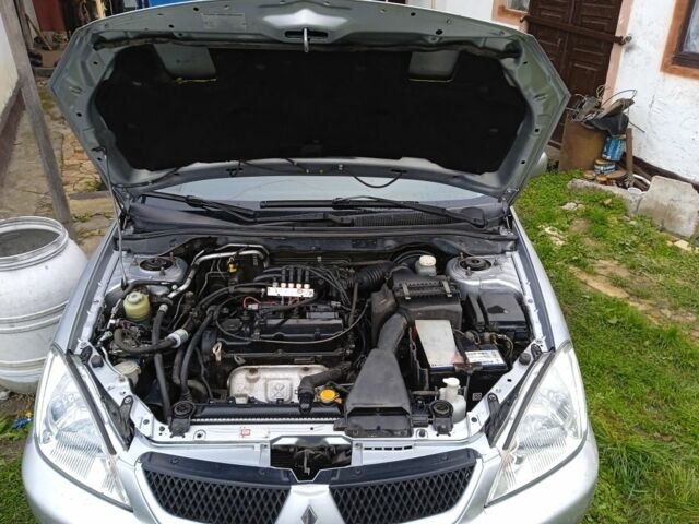 Сірий Міцубісі Lancer, об'ємом двигуна 1 л та пробігом 400 тис. км за 2850 $, фото 6 на Automoto.ua