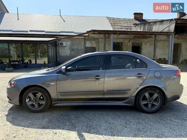 Сірий Міцубісі Lancer, об'ємом двигуна 2 л та пробігом 203 тис. км за 6200 $, фото 1 на Automoto.ua