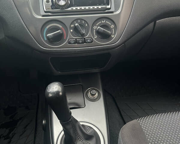 Серый Мицубиси Лансер, объемом двигателя 1.6 л и пробегом 254 тыс. км за 4500 $, фото 23 на Automoto.ua