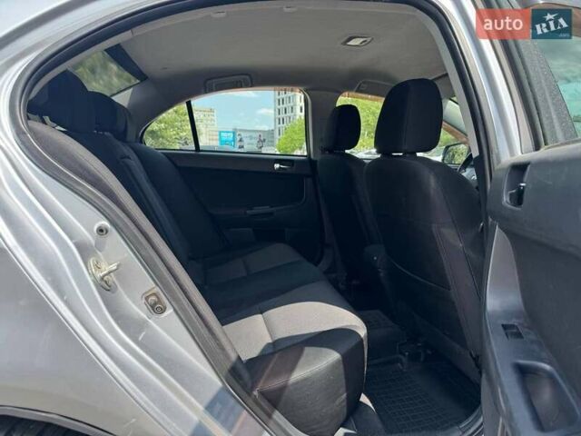Сірий Міцубісі Lancer, об'ємом двигуна 2 л та пробігом 149 тис. км за 6798 $, фото 2 на Automoto.ua