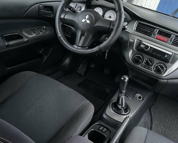 Сірий Міцубісі Lancer, об'ємом двигуна 1.6 л та пробігом 330 тис. км за 3500 $, фото 3 на Automoto.ua