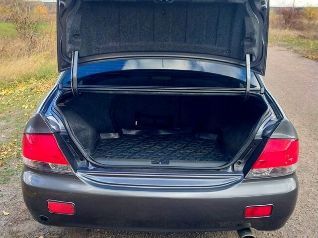 Сірий Міцубісі Lancer, об'ємом двигуна 1.6 л та пробігом 229 тис. км за 4500 $, фото 8 на Automoto.ua
