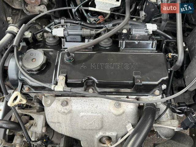 Серый Мицубиси Лансер, объемом двигателя 1.3 л и пробегом 160 тыс. км за 5555 $, фото 77 на Automoto.ua