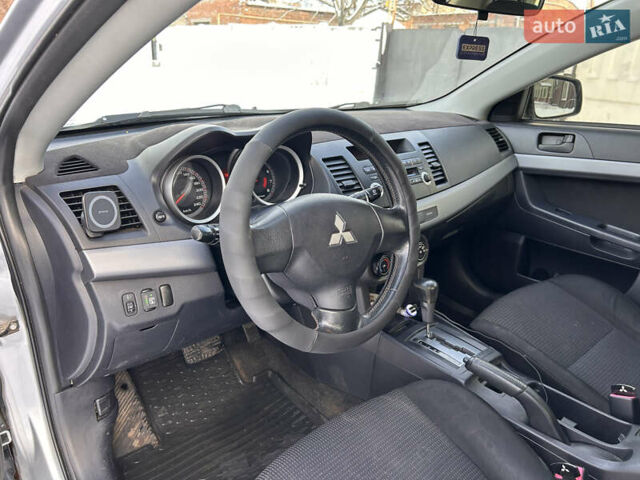 Сірий Міцубісі Lancer, об'ємом двигуна 1.5 л та пробігом 261 тис. км за 6200 $, фото 14 на Automoto.ua