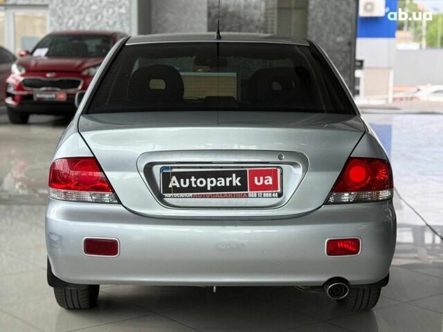 Серый Мицубиси Лансер, объемом двигателя 1.6 л и пробегом 174 тыс. км за 5990 $, фото 5 на Automoto.ua