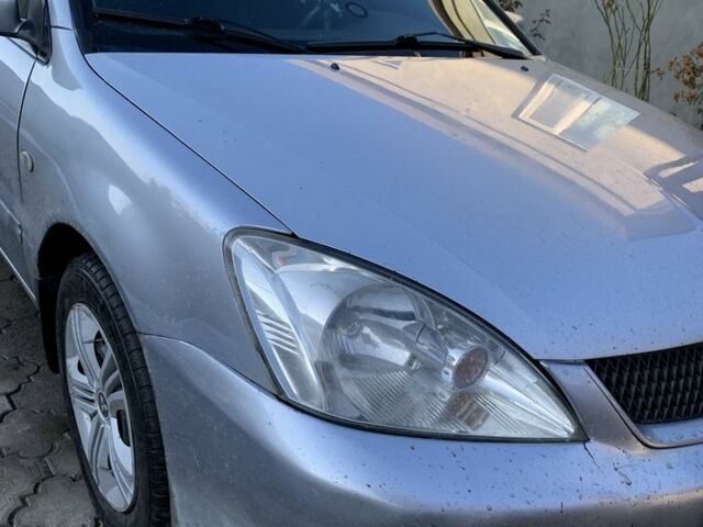 Сірий Міцубісі Lancer, об'ємом двигуна 1.6 л та пробігом 248 тис. км за 3000 $, фото 1 на Automoto.ua
