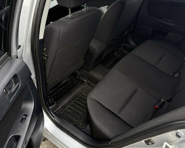 Серый Мицубиси Лансер, объемом двигателя 1.5 л и пробегом 97 тыс. км за 7300 $, фото 21 на Automoto.ua