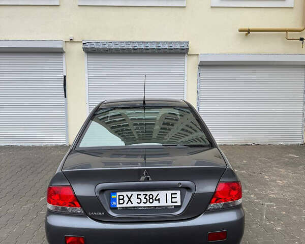 Серый Мицубиси Лансер, объемом двигателя 1.58 л и пробегом 187 тыс. км за 4800 $, фото 7 на Automoto.ua