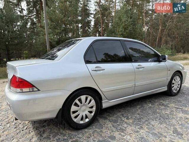 Серый Мицубиси Лансер, объемом двигателя 1.6 л и пробегом 200 тыс. км за 4400 $, фото 8 на Automoto.ua