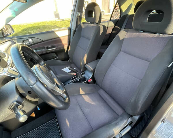 Мицубиси Лансер 2007 в Василькове на Automoto.ua Серый Мицубиси Лансер, объемом двигателя 2 л и пробегом 177 тыс. км за 5399 $, фото 14 на Automoto.ua