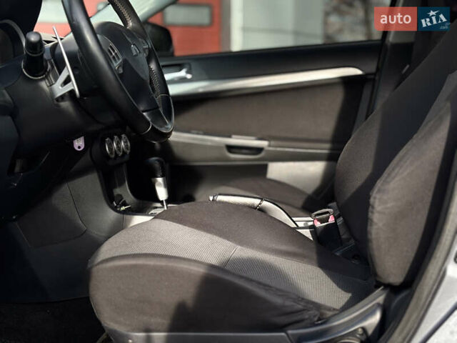 Сірий Міцубісі Lancer, об'ємом двигуна 2 л та пробігом 220 тис. км за 6800 $, фото 23 на Automoto.ua