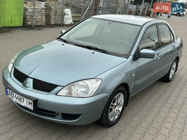 Сірий Міцубісі Lancer, об'ємом двигуна 1.6 л та пробігом 116 тис. км за 5199 $, фото 5 на Automoto.ua