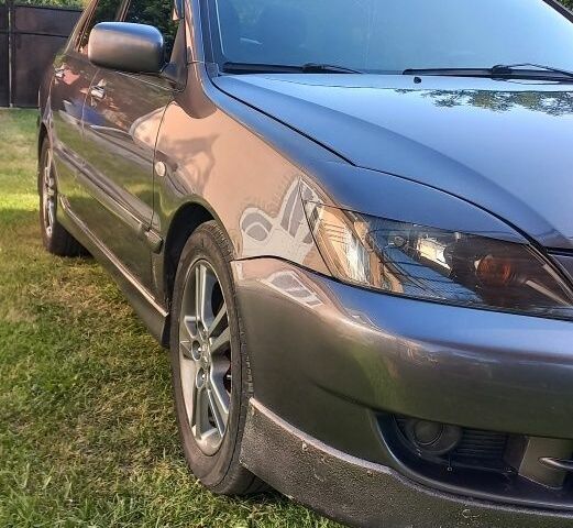 Сірий Міцубісі Lancer, об'ємом двигуна 2 л та пробігом 160 тис. км за 4900 $, фото 3 на Automoto.ua