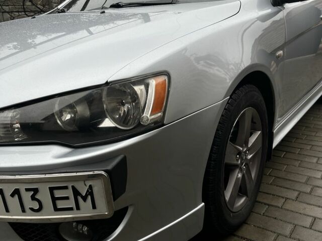 Серый Мицубиси Лансер, объемом двигателя 2 л и пробегом 227 тыс. км за 6600 $, фото 3 на Automoto.ua