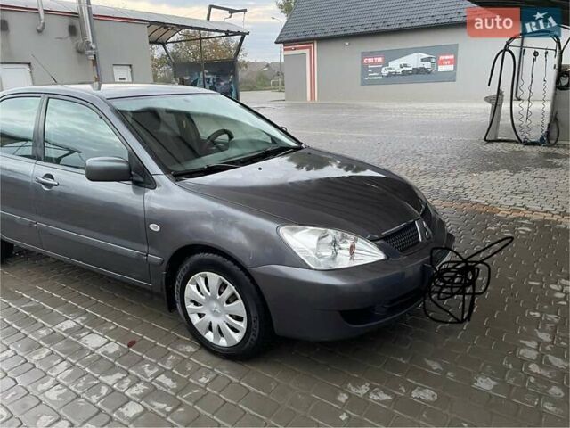 Сірий Міцубісі Lancer, об'ємом двигуна 1.6 л та пробігом 330 тис. км за 3500 $, фото 17 на Automoto.ua