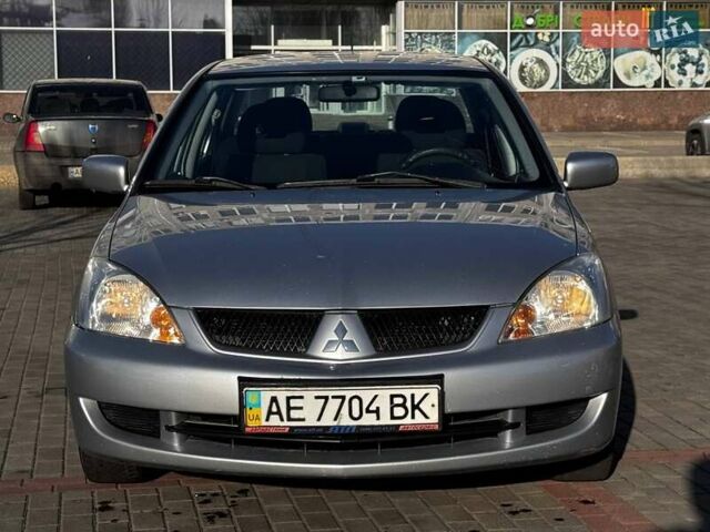 Сірий Міцубісі Lancer, об'ємом двигуна 1.6 л та пробігом 237 тис. км за 4950 $, фото 2 на Automoto.ua