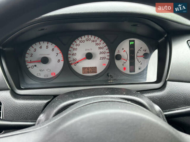 Сірий Міцубісі Lancer, об'ємом двигуна 1.6 л та пробігом 116 тис. км за 5199 $, фото 18 на Automoto.ua