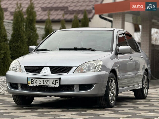 Сірий Міцубісі Lancer, об'ємом двигуна 1.6 л та пробігом 281 тис. км за 3999 $, фото 6 на Automoto.ua