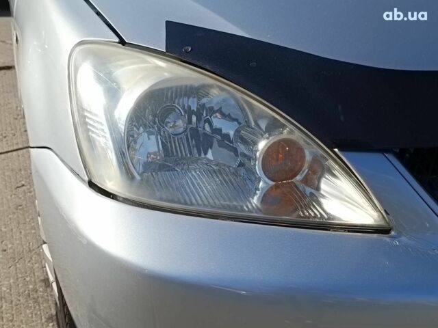 Сірий Міцубісі Lancer, об'ємом двигуна 1.6 л та пробігом 222 тис. км за 3990 $, фото 4 на Automoto.ua