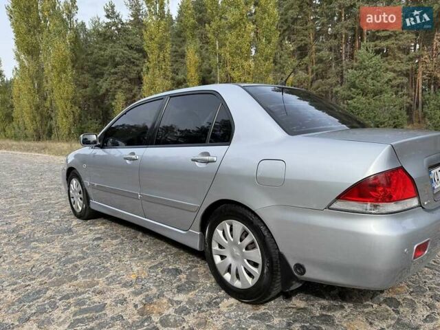 Серый Мицубиси Лансер, объемом двигателя 1.6 л и пробегом 200 тыс. км за 4400 $, фото 10 на Automoto.ua