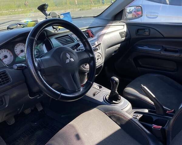 Сірий Міцубісі Lancer, об'ємом двигуна 1.6 л та пробігом 293 тис. км за 5000 $, фото 7 на Automoto.ua