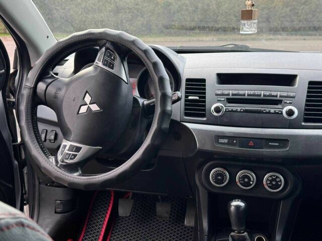 Серый Мицубиси Лансер, объемом двигателя 2 л и пробегом 207 тыс. км за 5800 $, фото 16 на Automoto.ua