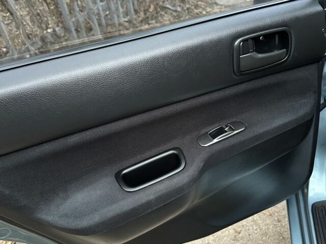 Серый Мицубиси Лансер, объемом двигателя 1.6 л и пробегом 238 тыс. км за 4300 $, фото 4 на Automoto.ua