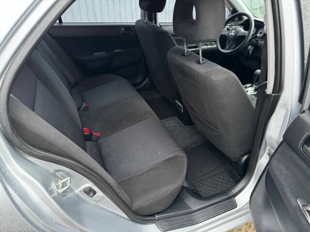 Серый Мицубиси Лансер, объемом двигателя 1.6 л и пробегом 205 тыс. км за 5300 $, фото 13 на Automoto.ua