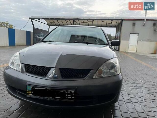 Сірий Міцубісі Lancer, об'ємом двигуна 1.6 л та пробігом 330 тис. км за 3500 $, фото 24 на Automoto.ua