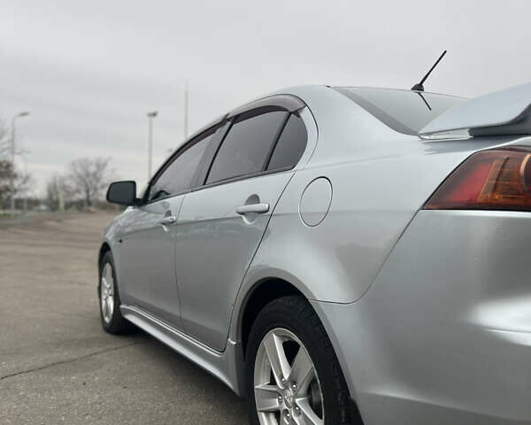 Серый Мицубиси Лансер, объемом двигателя 2 л и пробегом 286 тыс. км за 5800 $, фото 4 на Automoto.ua