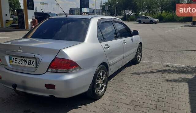 Серый Мицубиси Лансер, объемом двигателя 1.6 л и пробегом 420 тыс. км за 4900 $, фото 8 на Automoto.ua