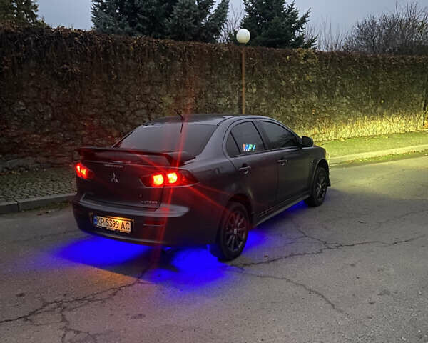 Серый Мицубиси Лансер, объемом двигателя 1.5 л и пробегом 224 тыс. км за 6300 $, фото 10 на Automoto.ua