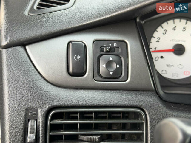 Серый Мицубиси Лансер, объемом двигателя 1.3 л и пробегом 160 тыс. км за 5555 $, фото 43 на Automoto.ua