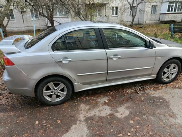 Сірий Міцубісі Lancer, об'ємом двигуна 1.5 л та пробігом 268 тис. км за 5935 $, фото 4 на Automoto.ua