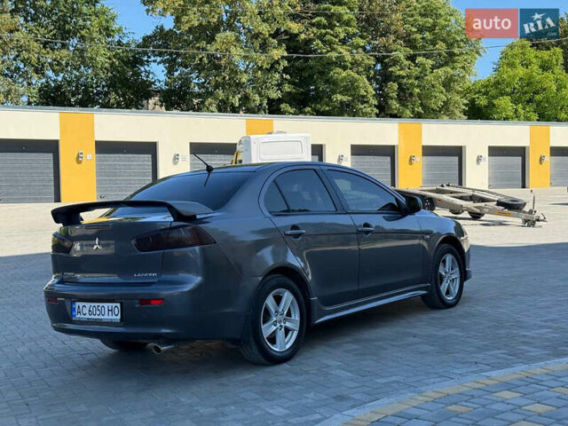 Сірий Міцубісі Lancer, об'ємом двигуна 2 л та пробігом 298 тис. км за 5600 $, фото 3 на Automoto.ua