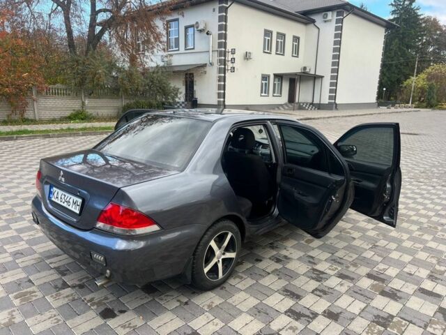 Міцубісі Lancer 2007 у Белой Церкве на Automoto.ua Сірий Міцубісі Lancer, об'ємом двигуна 1.6 л та пробігом 254 тис. км за 3200 $, фото 7 на Automoto.ua