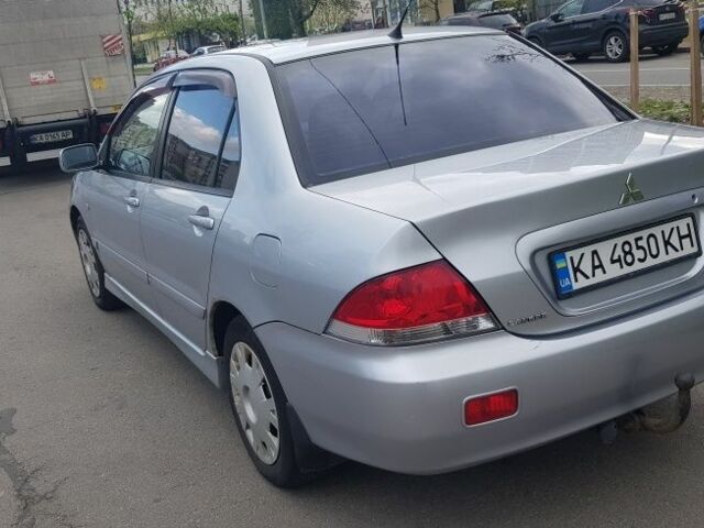 Сірий Міцубісі Lancer, об'ємом двигуна 0 л та пробігом 275 тис. км за 3800 $, фото 3 на Automoto.ua