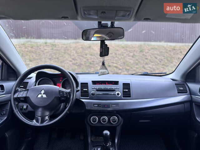 Сірий Міцубісі Lancer, об'ємом двигуна 2 л та пробігом 222 тис. км за 6300 $, фото 17 на Automoto.ua