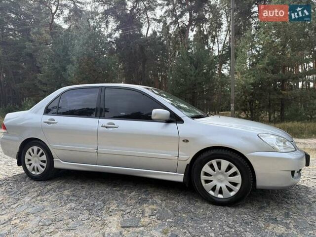 Серый Мицубиси Лансер, объемом двигателя 1.6 л и пробегом 200 тыс. км за 4400 $, фото 4 на Automoto.ua