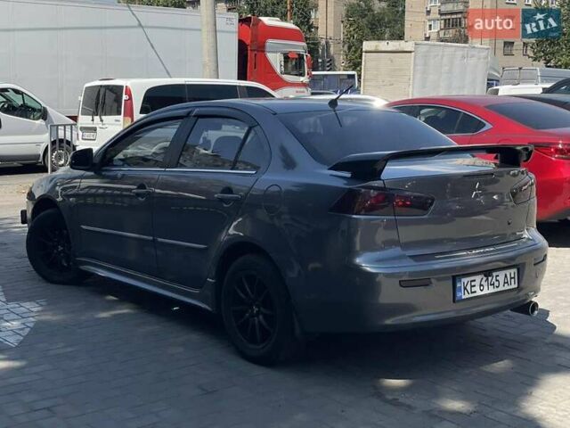 Сірий Міцубісі Lancer, об'ємом двигуна 2 л та пробігом 203 тис. км за 6999 $, фото 5 на Automoto.ua
