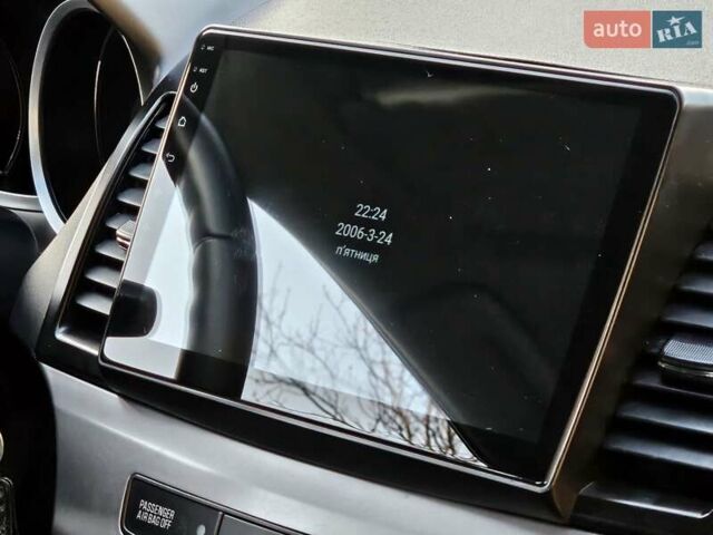 Серый Мицубиси Лансер, объемом двигателя 2 л и пробегом 282 тыс. км за 5450 $, фото 51 на Automoto.ua